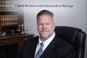 Ronald S. Cook, Esq., New York attorney, professional office portrait used on client reviews and independent ratings page